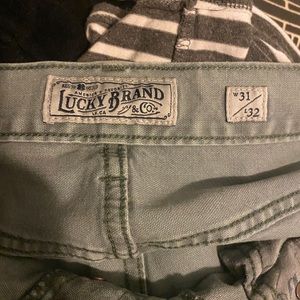 Lucky 110 Skinny jeans in light olive.